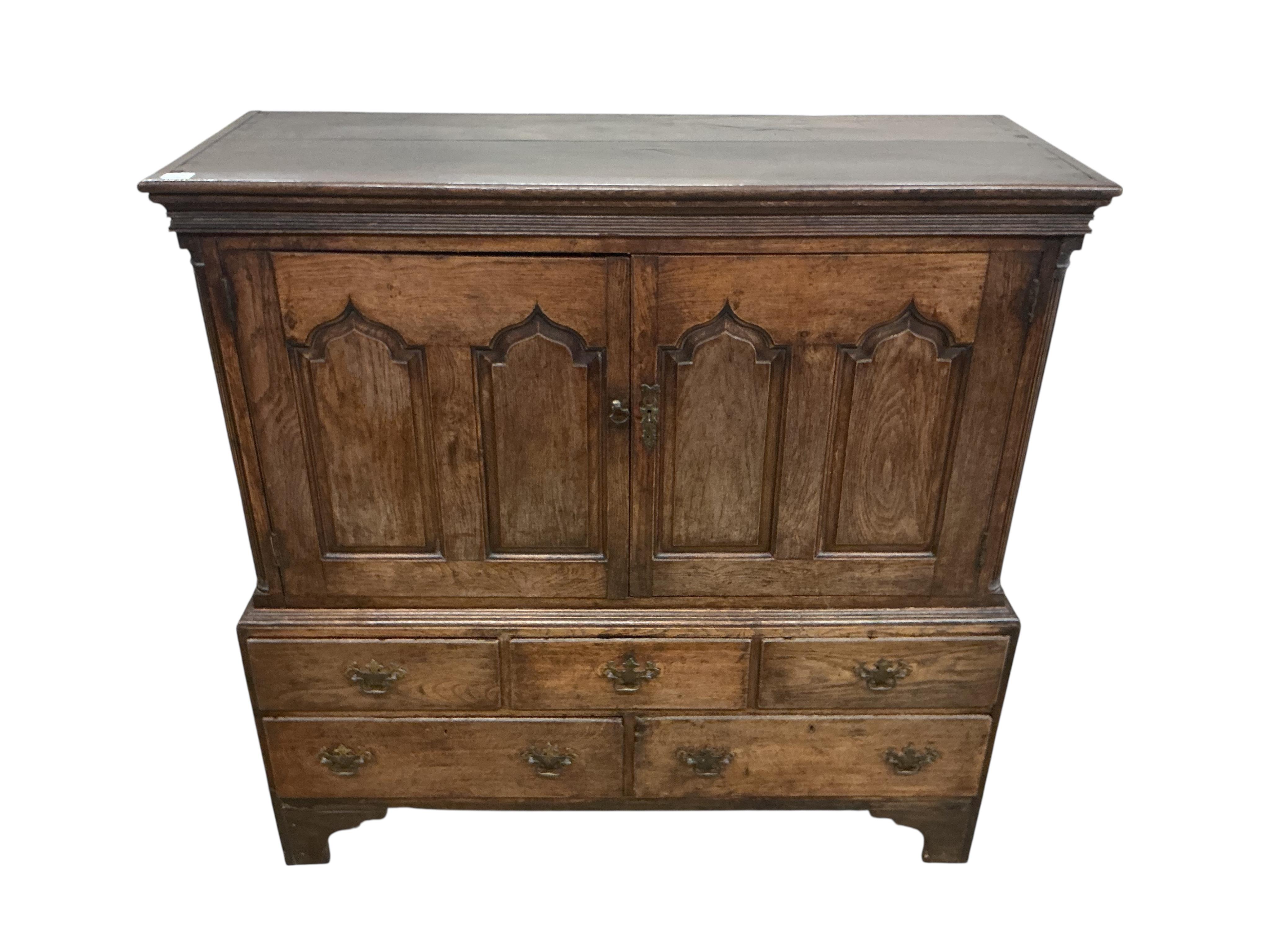 A late 18th century North Wales oak press cupboard, width 136cm, depth 51cm, height 136cm